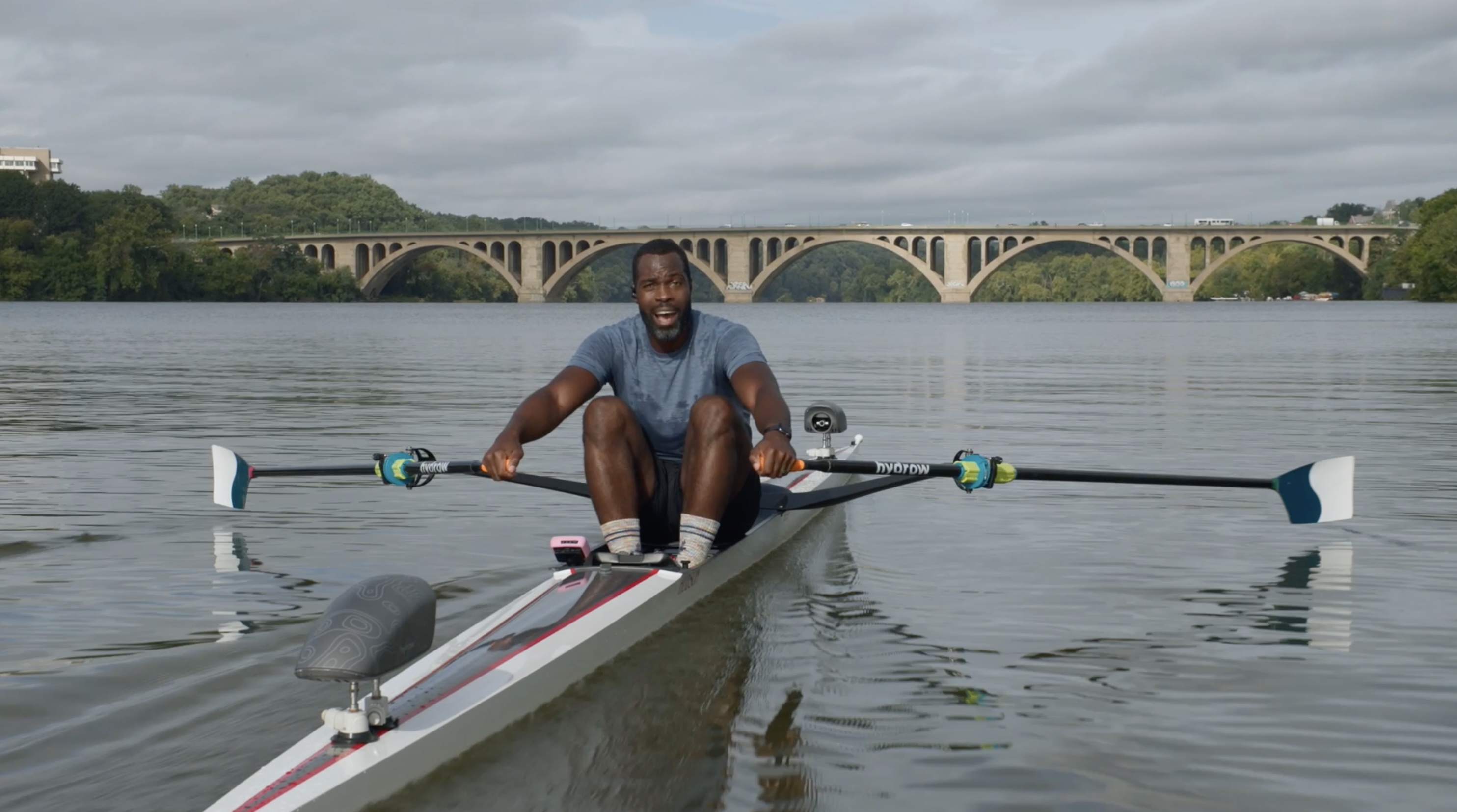 Aquil Abdullah in Bow and Henry Nuzum in stern, rowing on the Potomac River.